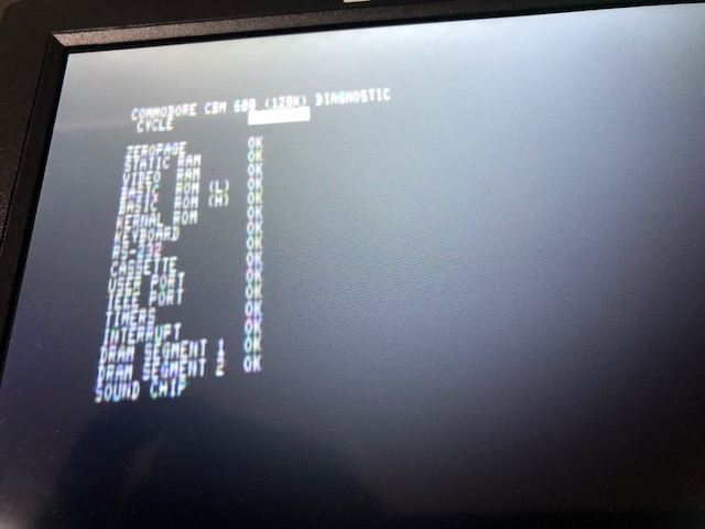 Camera image of the Commodore B128 displaying diagnostic results